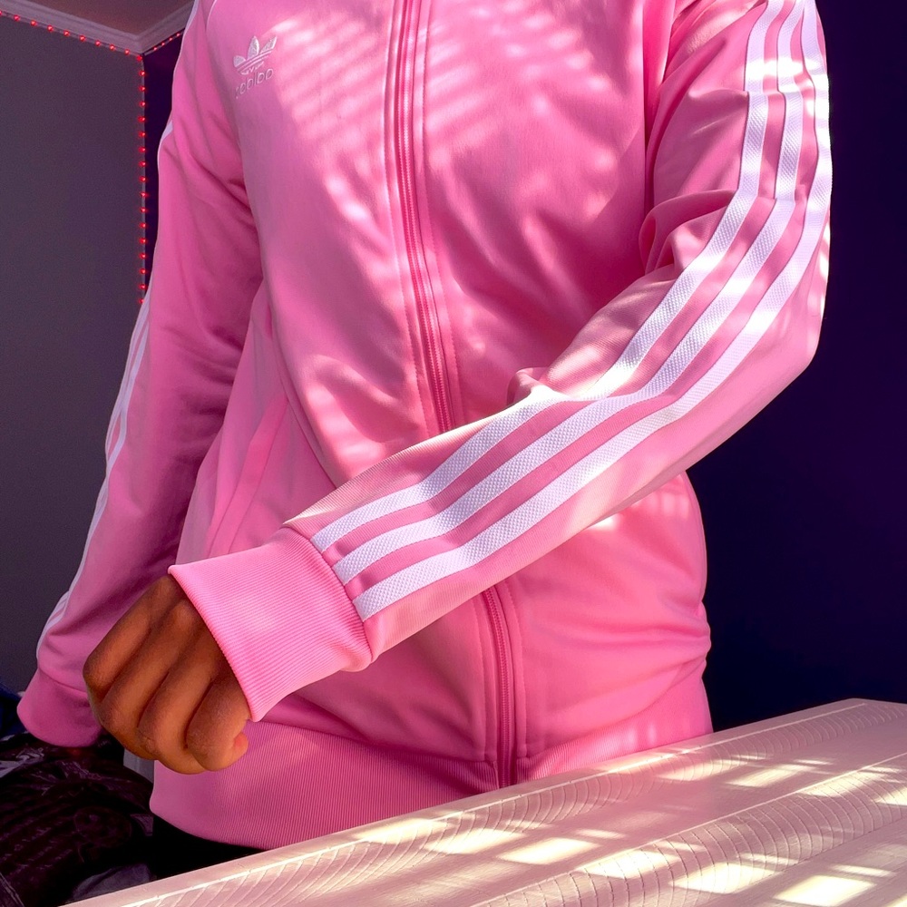 I’m selling a pink Adidas hoodie zip up